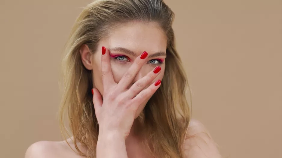 Woman with red manicure