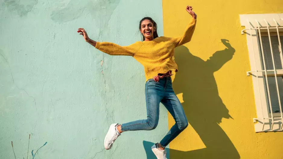 Young Indian woman jumping